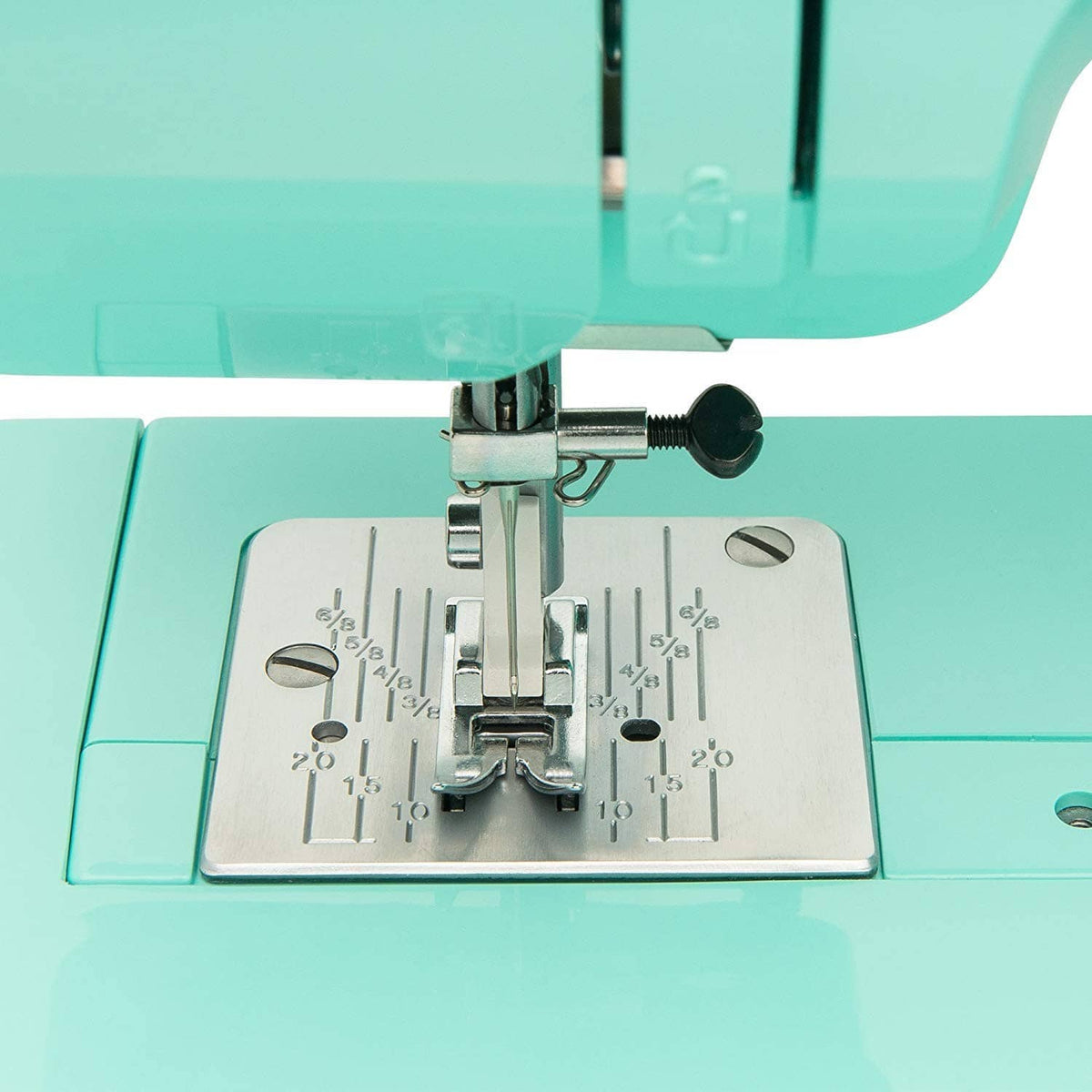 Turquoise presser foot and metal feed plate with stitch guide markings
