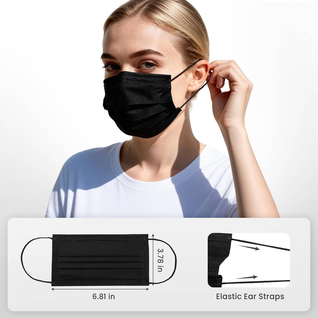 3-ply black disposable face mask with elastic ear loops, worn by woman