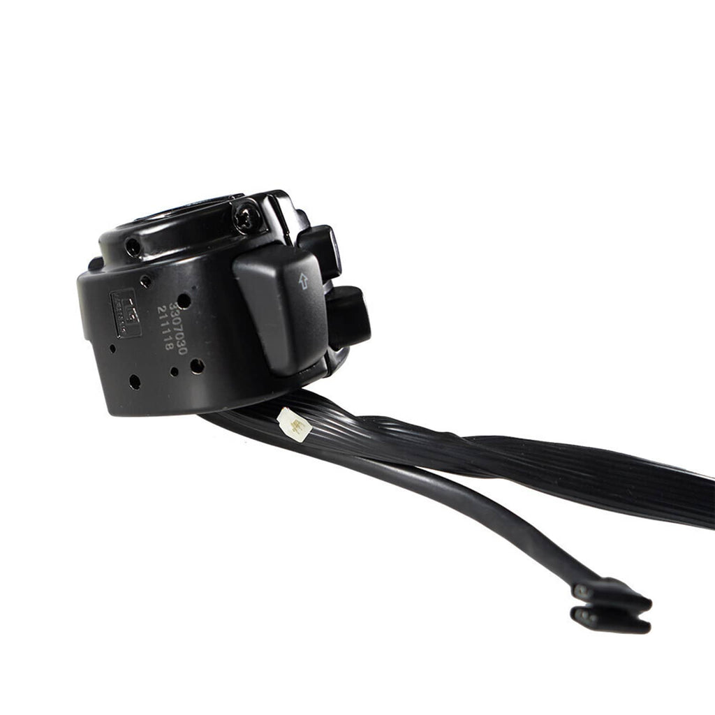 Black switch housing underside with mounting holes and attached wiring harness