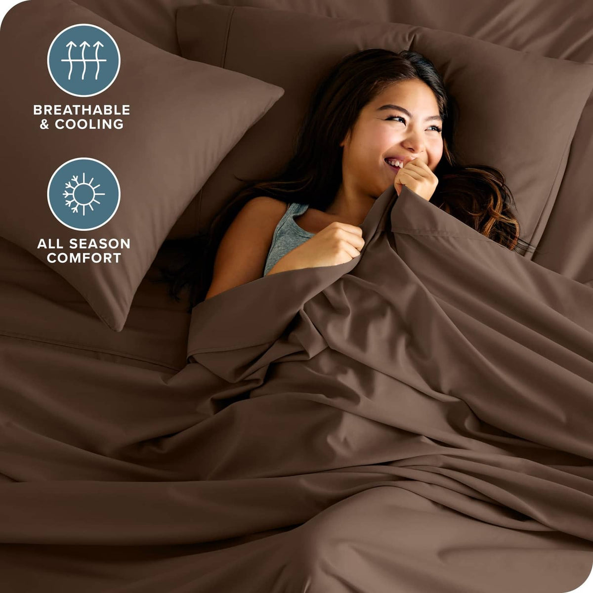 Cocoa brown sheet set with pillow and soft fabric drape over the mattress