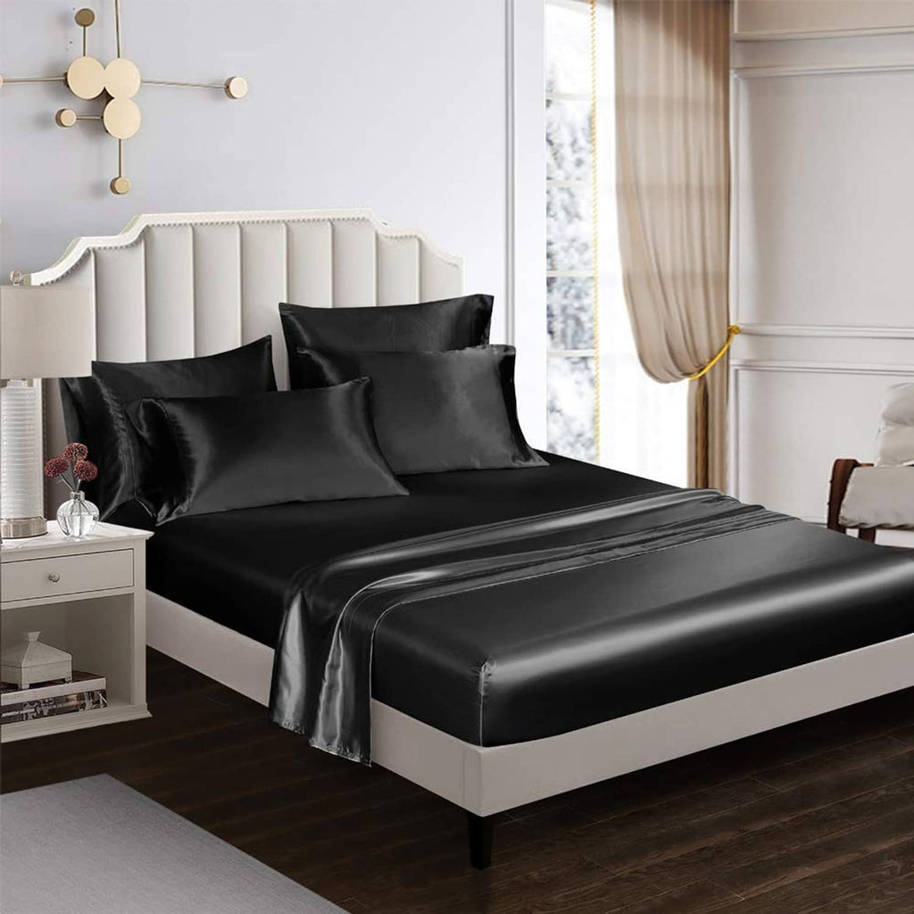 Black satin bedding sheet set on queen bed, fitted sheet with pillowcases