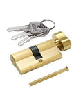 Brushed brass lock cylinder with three keys on a keyring and mounting screw