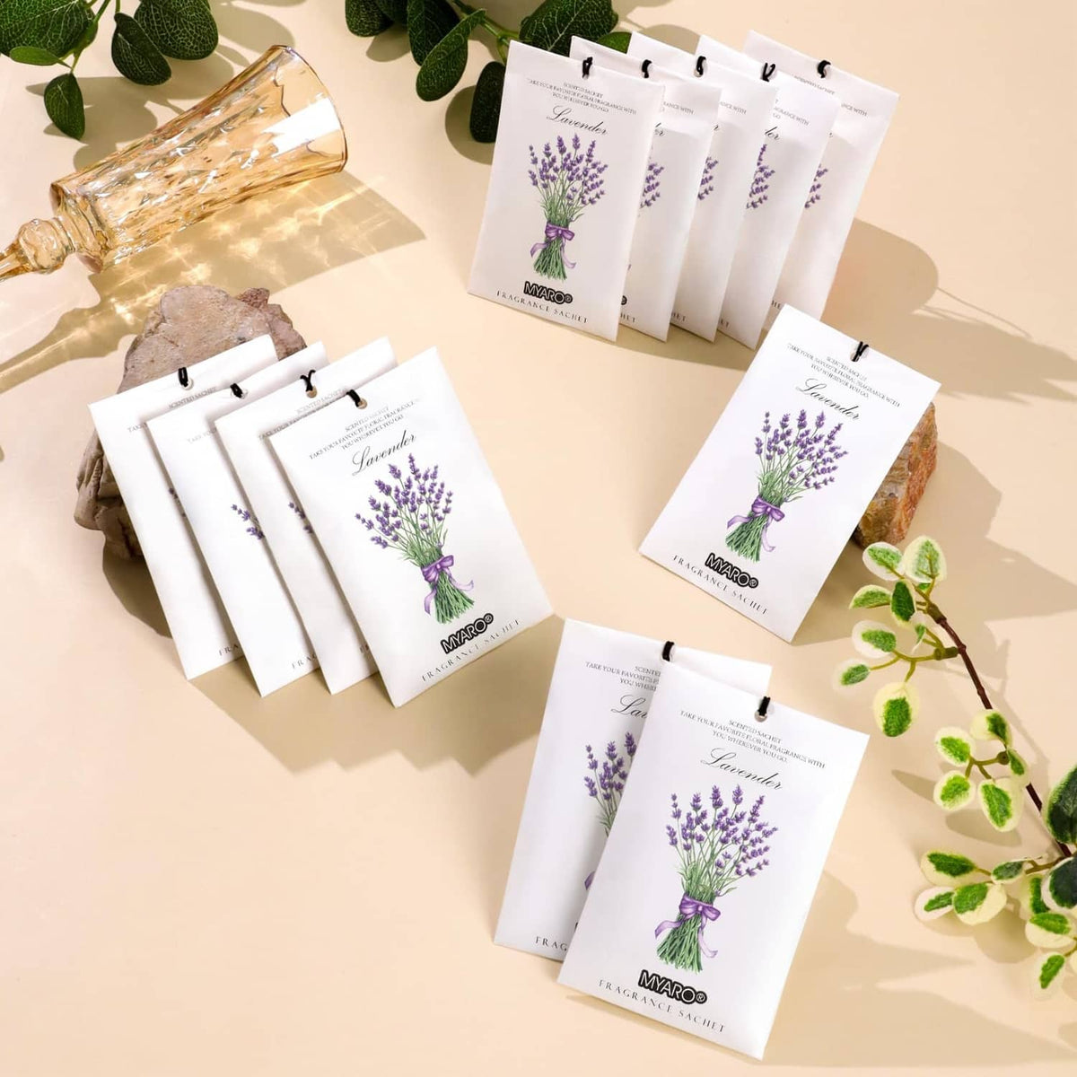 Lavender fragrance sachet bags with lavender bouquet art, arranged in a cluster