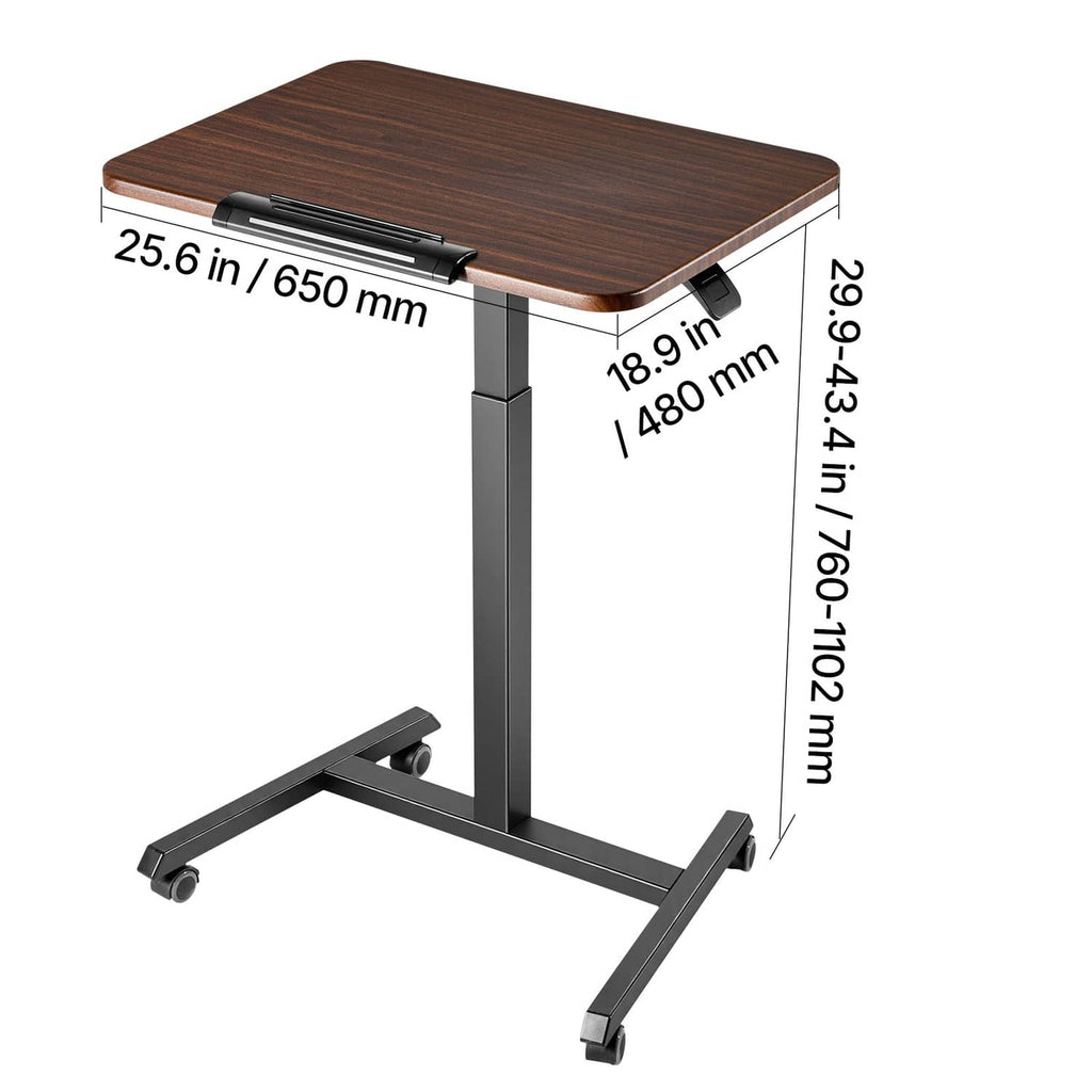 Adjustable height standing desk with brown wood top and gray frame, tilting desktop