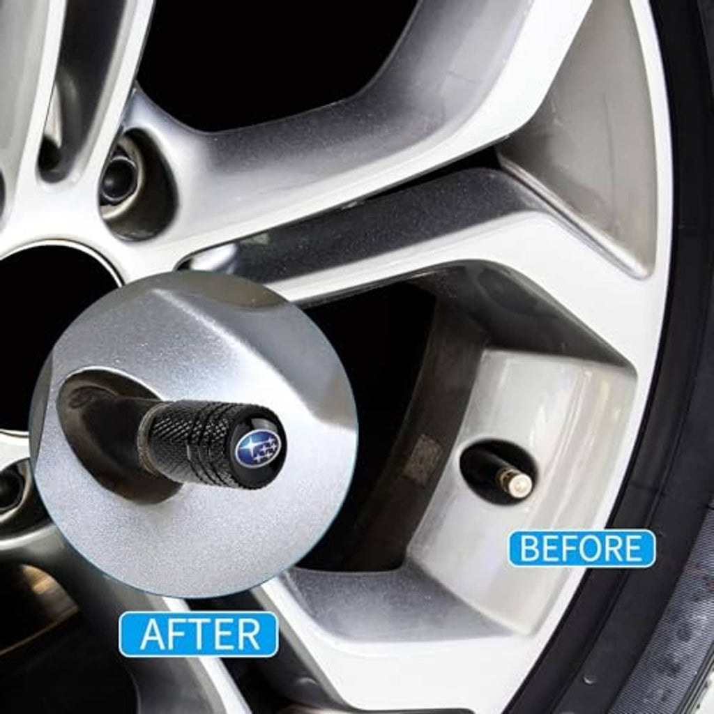 Black textured valve stem cap with blue Subaru star emblem installed on wheel rim.