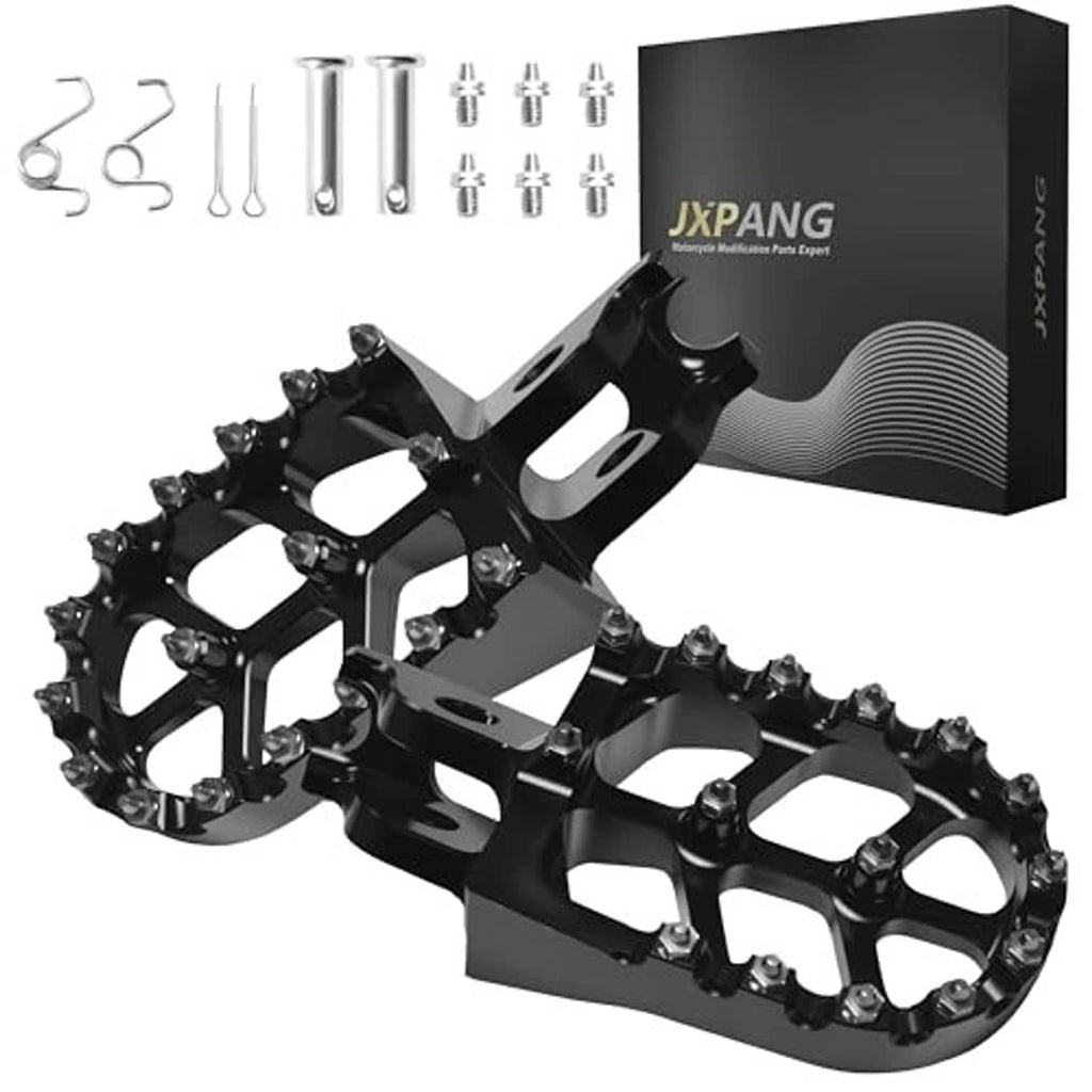 Wide black dirt bike foot pegs set with anti-slip studs and included mounting parts