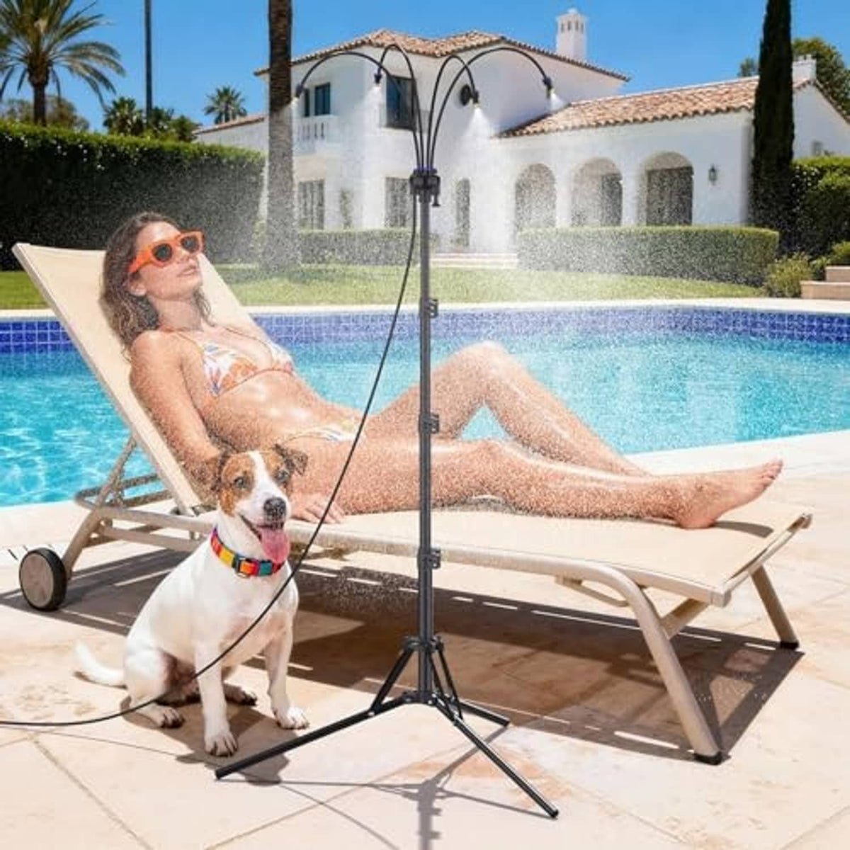 Outdoor misting tripod stand with tall pole, twin nozzles, and connected garden hose