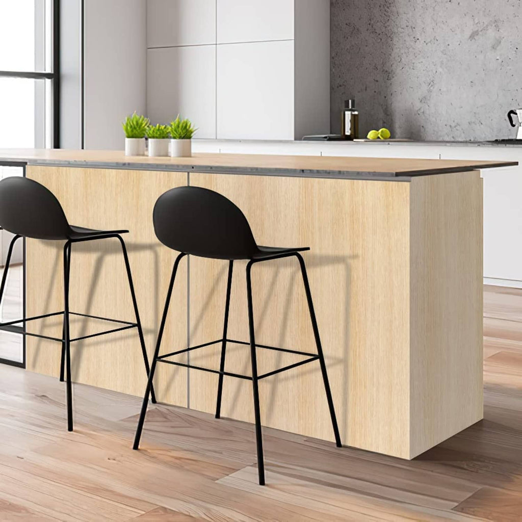 Light oak woodgrain contact paper covering a kitchen island front and countertop