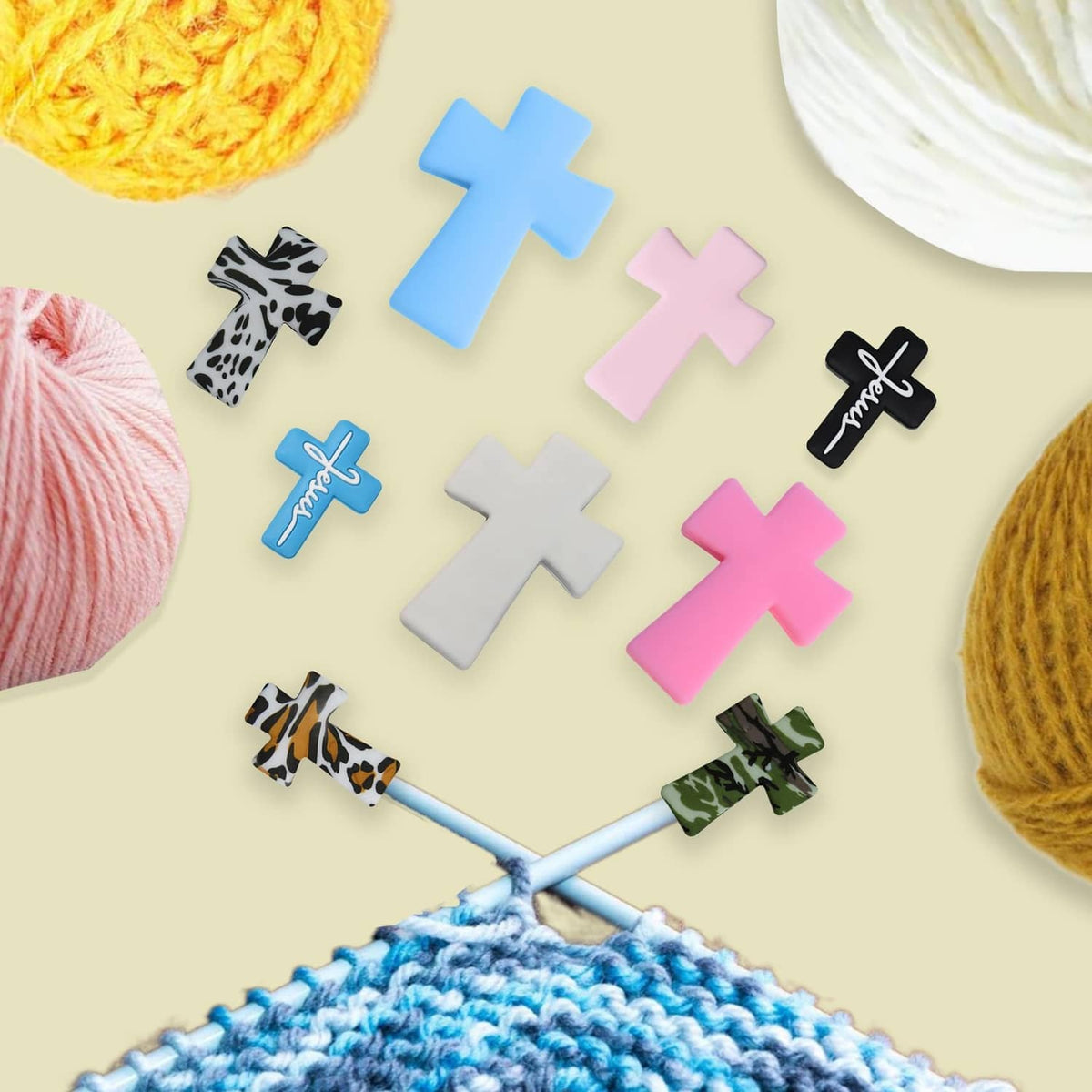 Cross-shaped silicone needle point stoppers in solid and leopard-style patterns