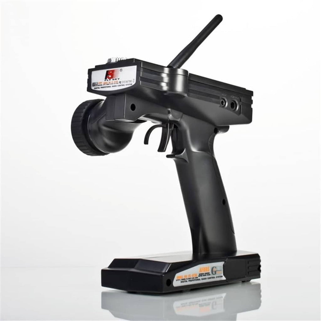 Black RC car transmitter with antenna and control trigger, front-side view