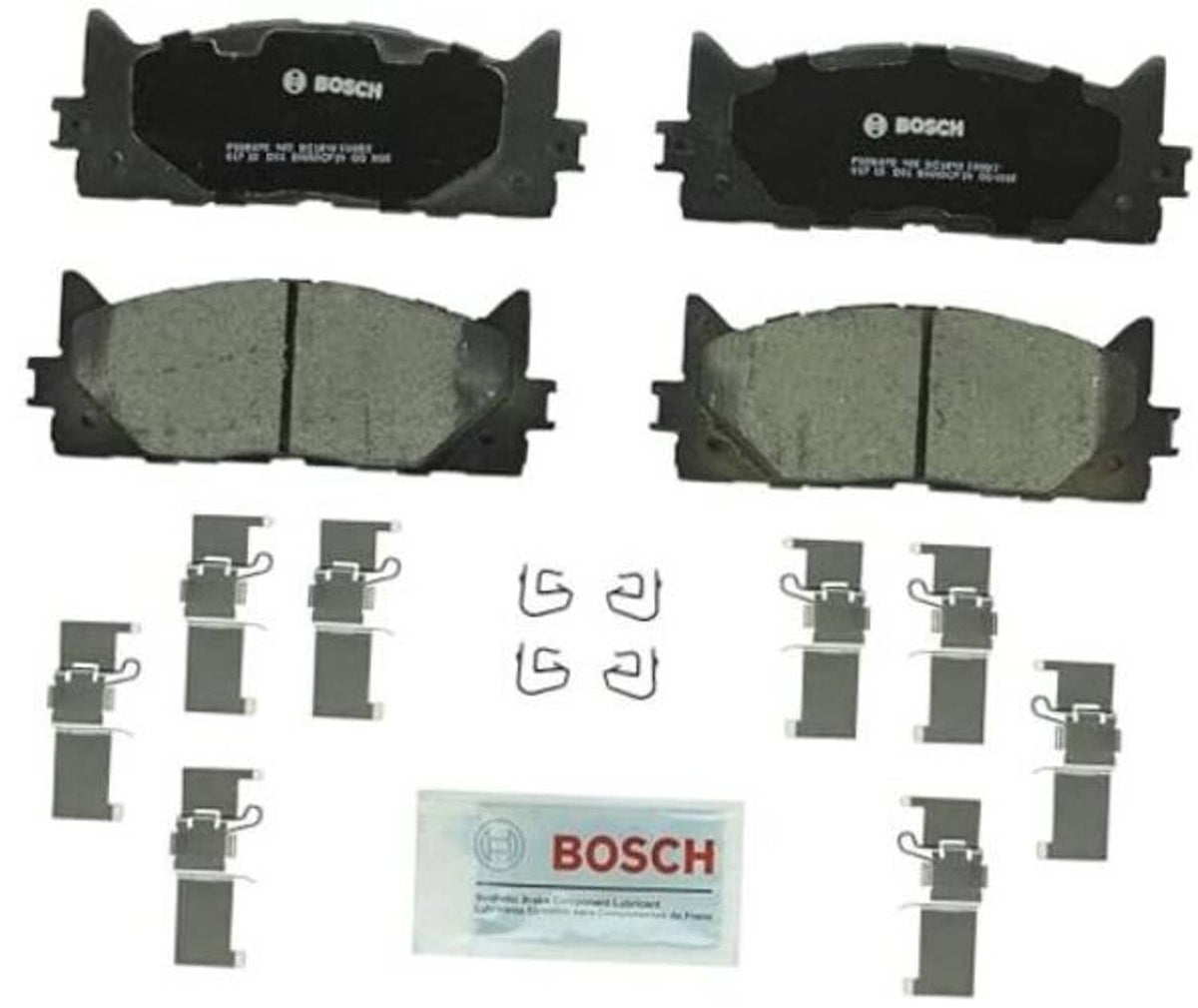 Ceramic disc brake pad set with 4 pads, clips, and shims; BOSCH branding