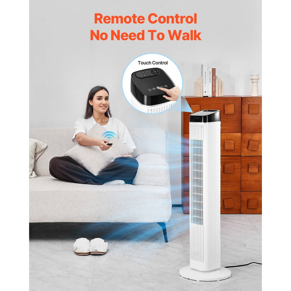 White tower fan with remote control and touch control panel on the black top