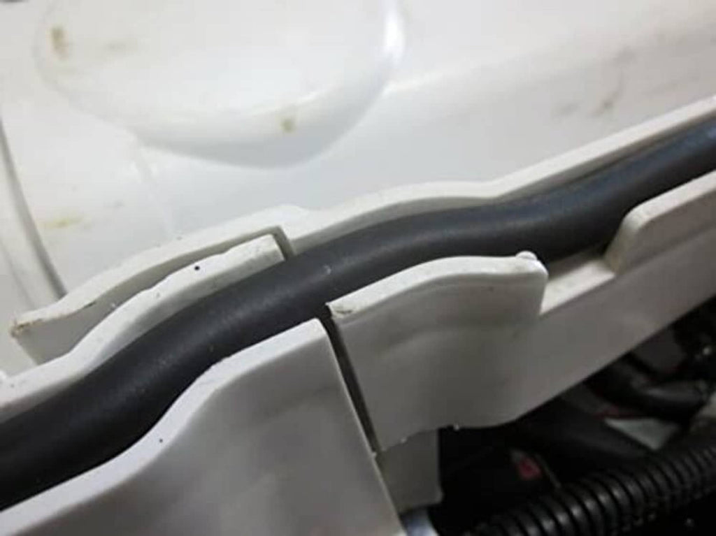Close-up of black rubber seal gasket between front rack storage panels