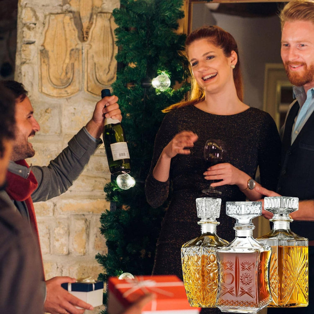 Crystal whiskey decanter set with two amber and one clear bottles, diamond-cut glass