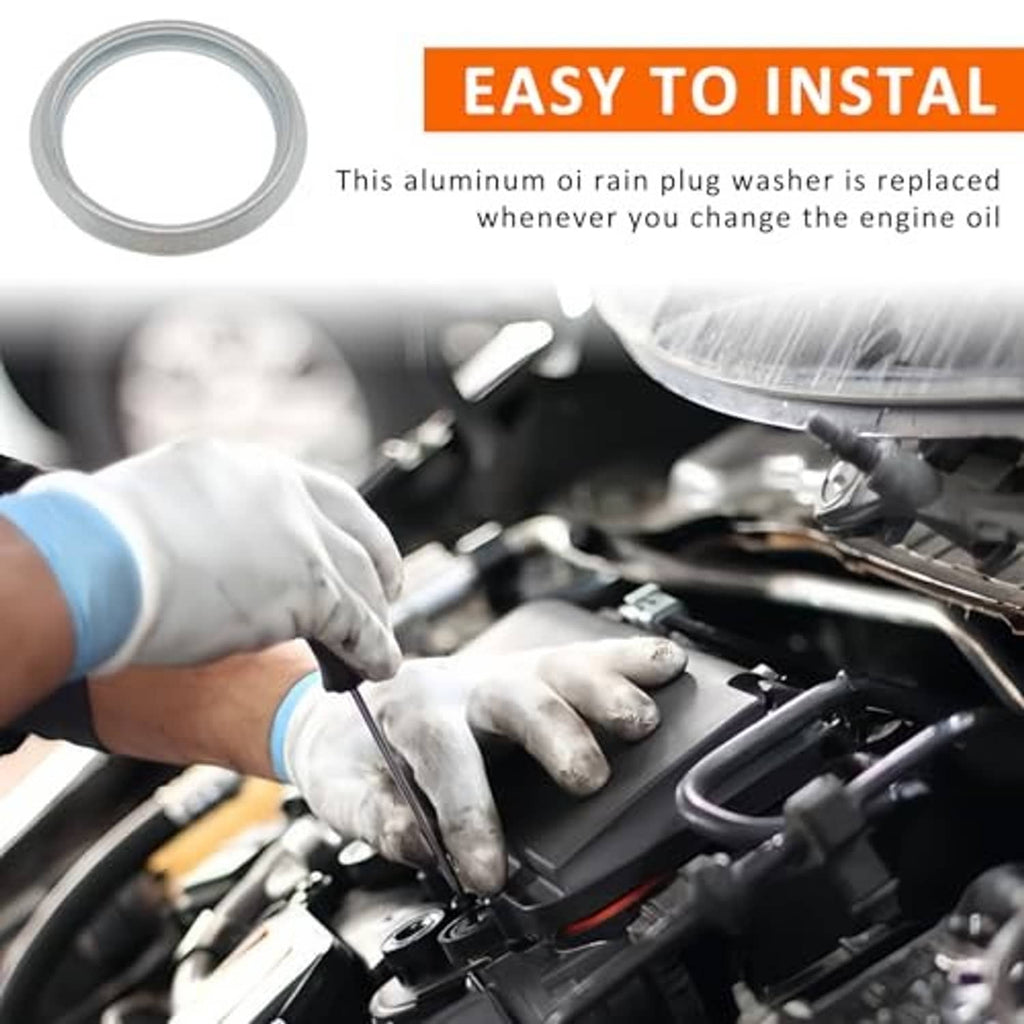 Oil drain plug crush washer being installed under the hood with gloved hands