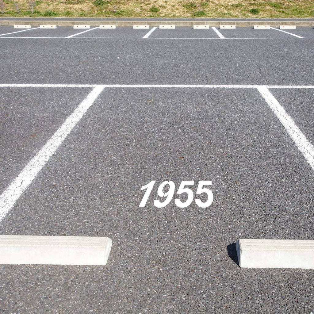 Stenciled address number 1955 on pavement