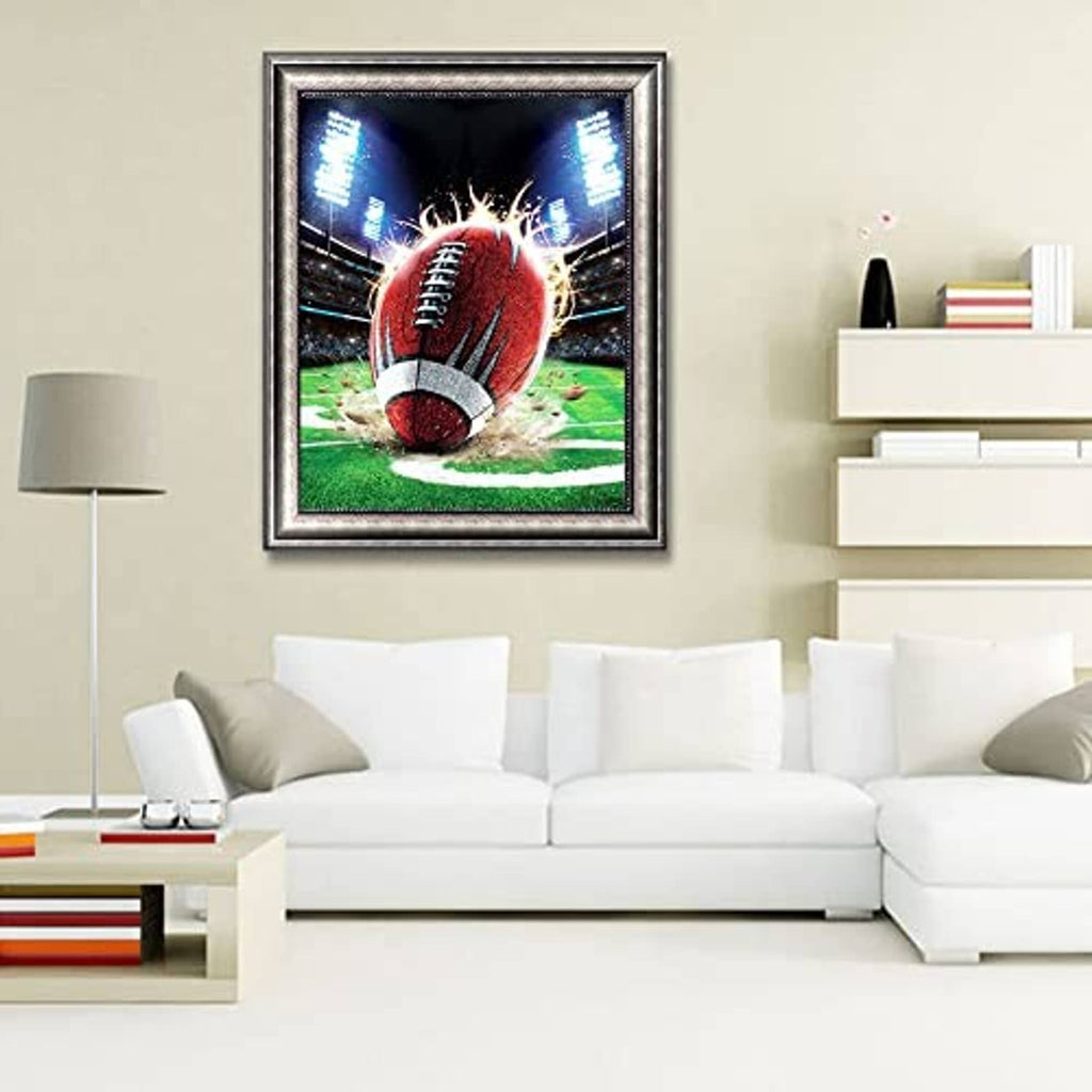 Small framed football diamond painting artwork featuring a red football and stadium lights