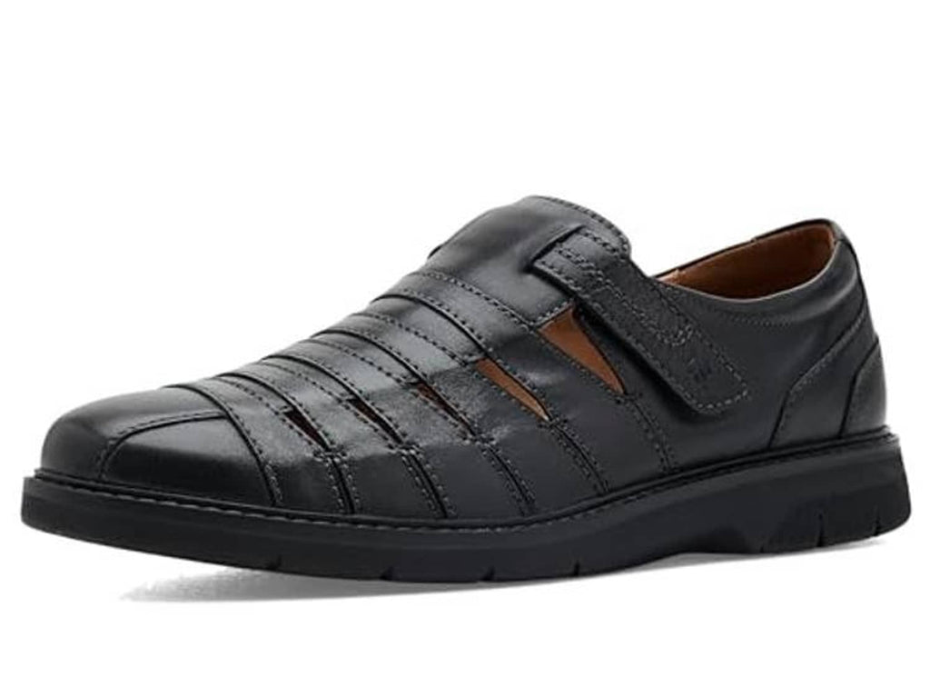 Black leather casual shoe with side strap, cushioned upper, and stitched lines