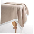Soft microfiber double-sided blanket in khaki, white border stripe and hem.