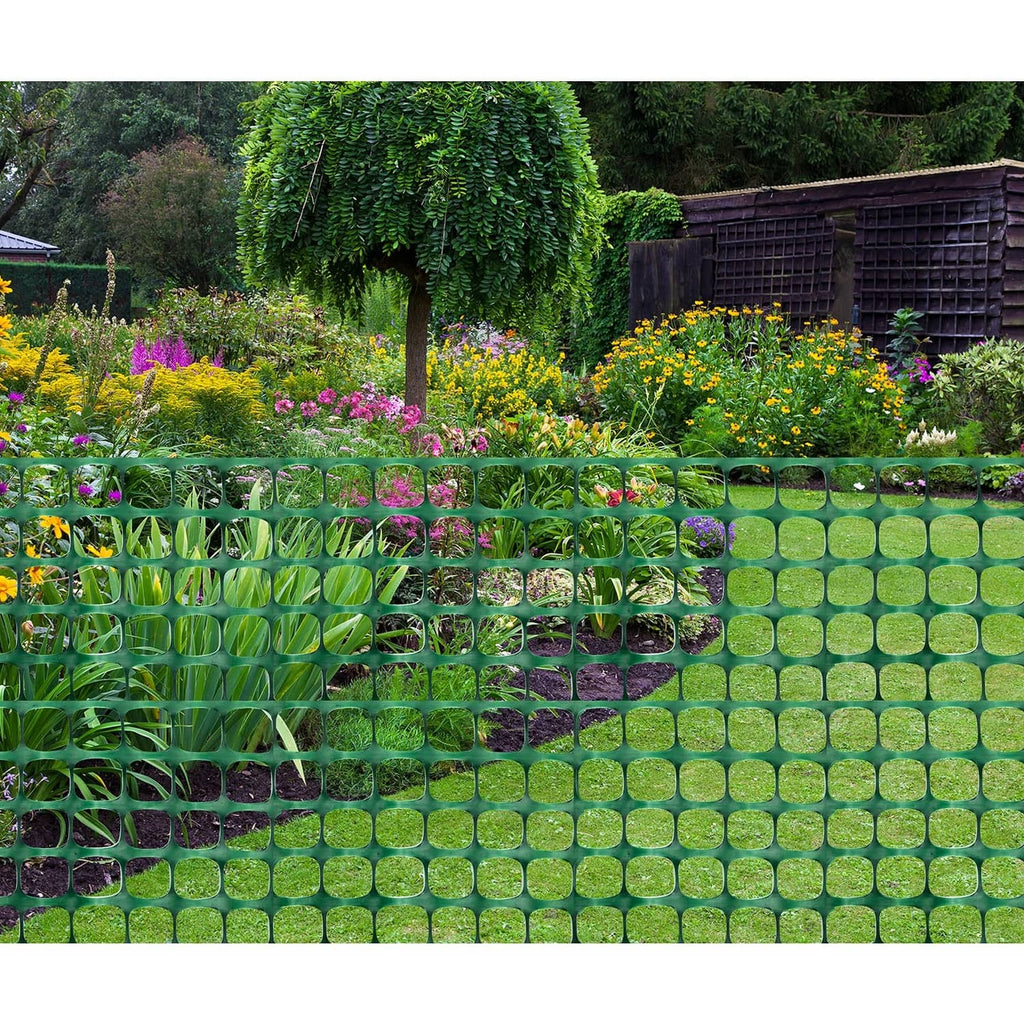 Green plastic mesh garden fence barrier with square grid openings