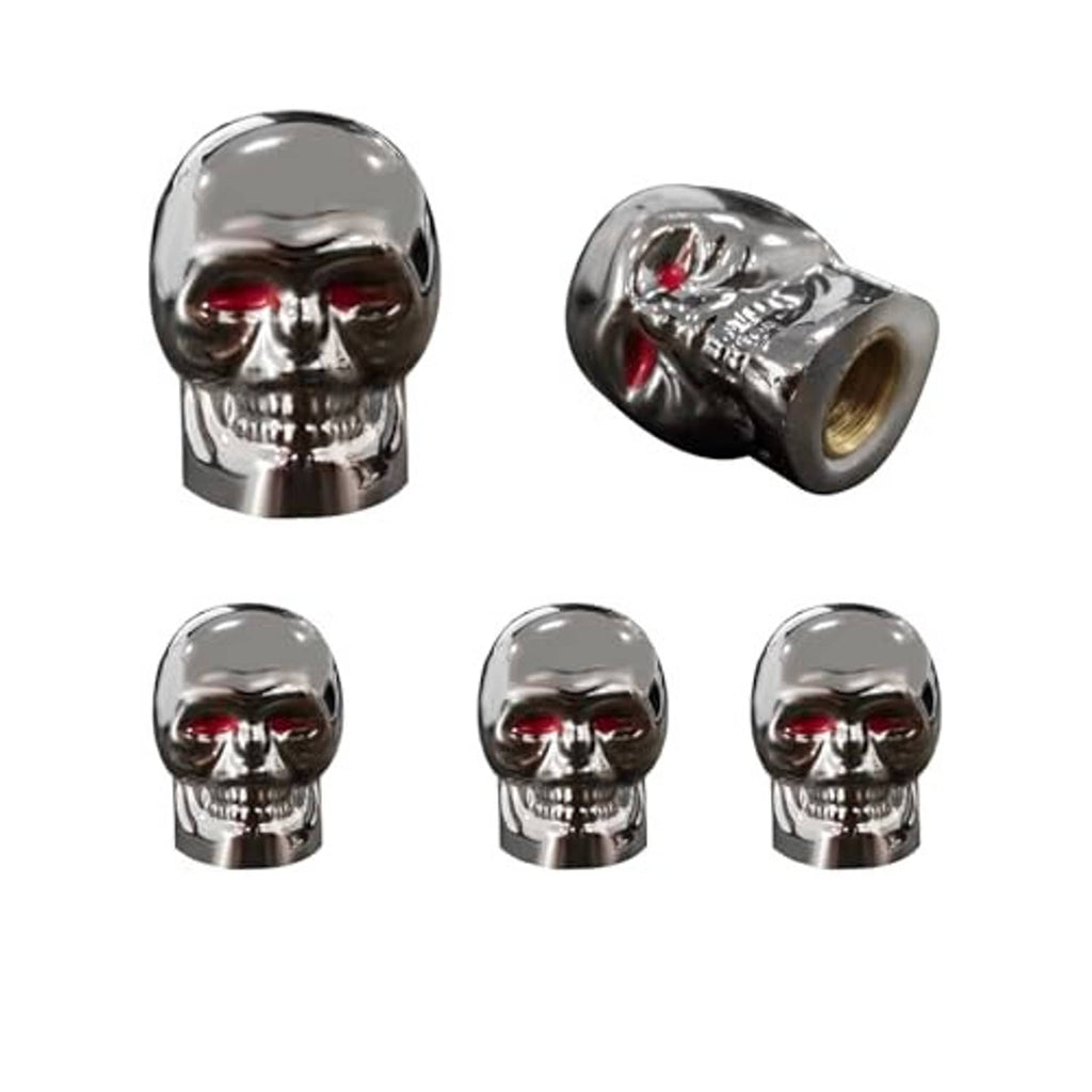 Chrome skull tire valve stem caps with red eyes, angled view and threaded tip