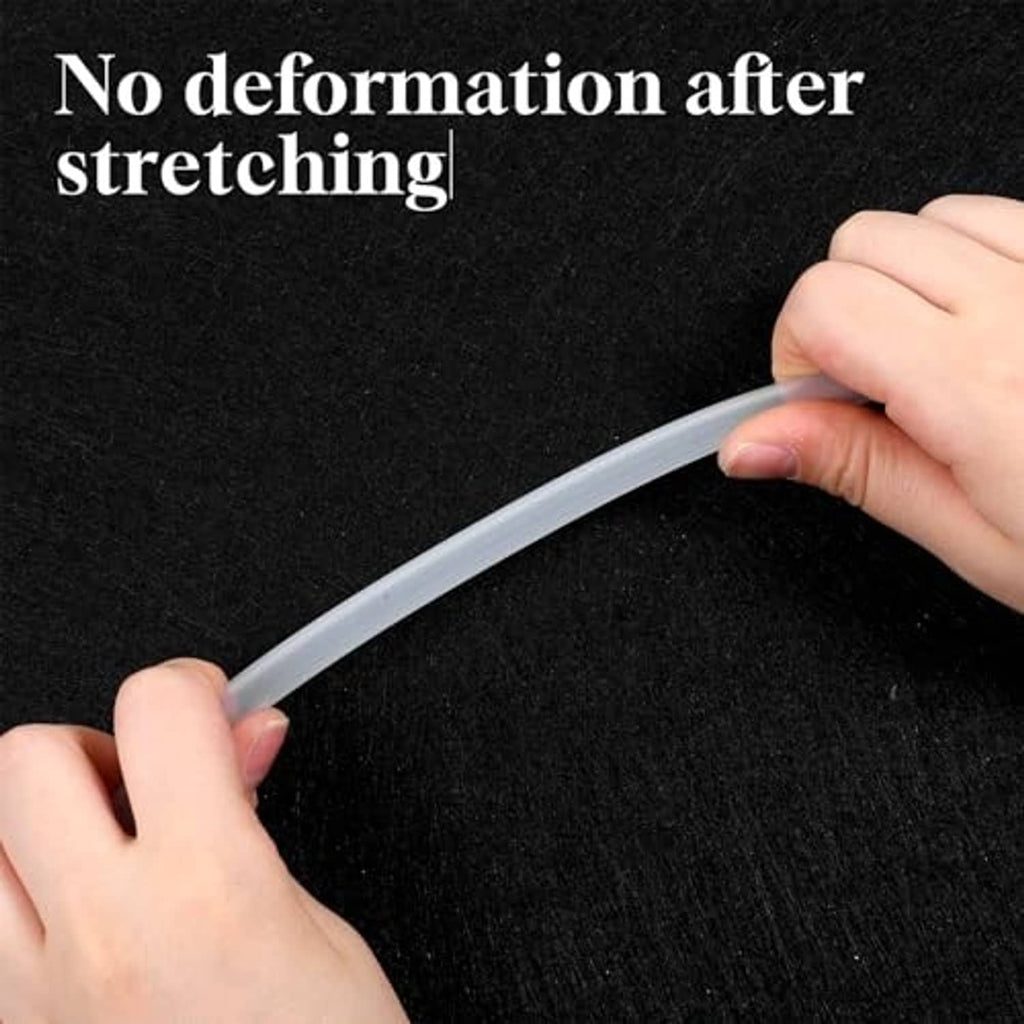 Flexible light-gray silicone tubing being stretched by hands, smooth tube section