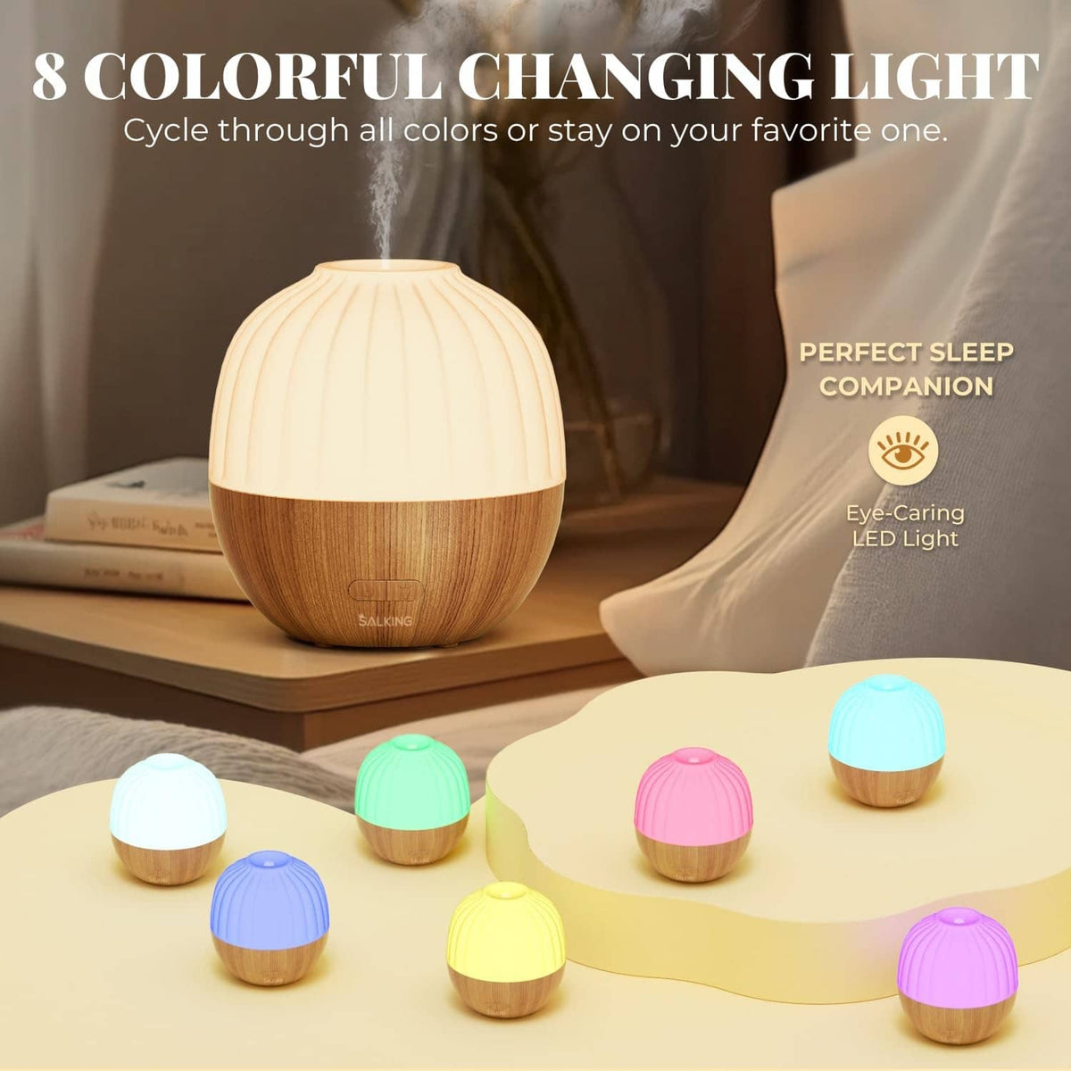 Wood-and-white essential oil diffuser with glowing LED light in multiple colors