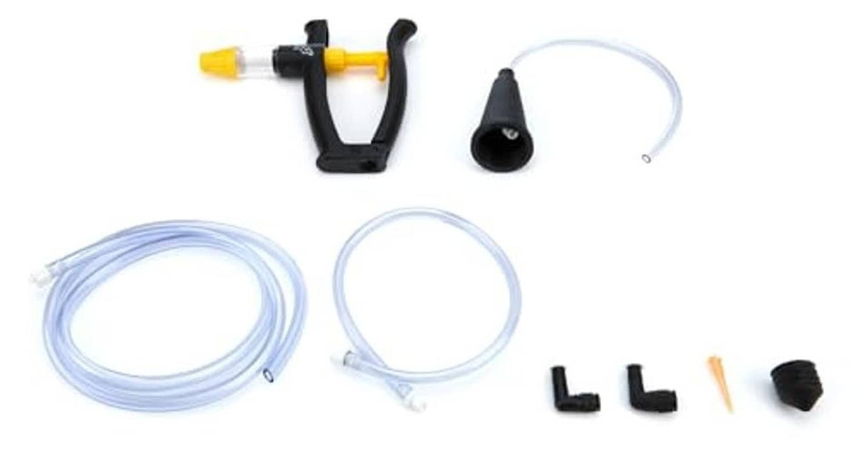 Brake bleeder kit with clear tubing, black clamp, funnel, and small accessories