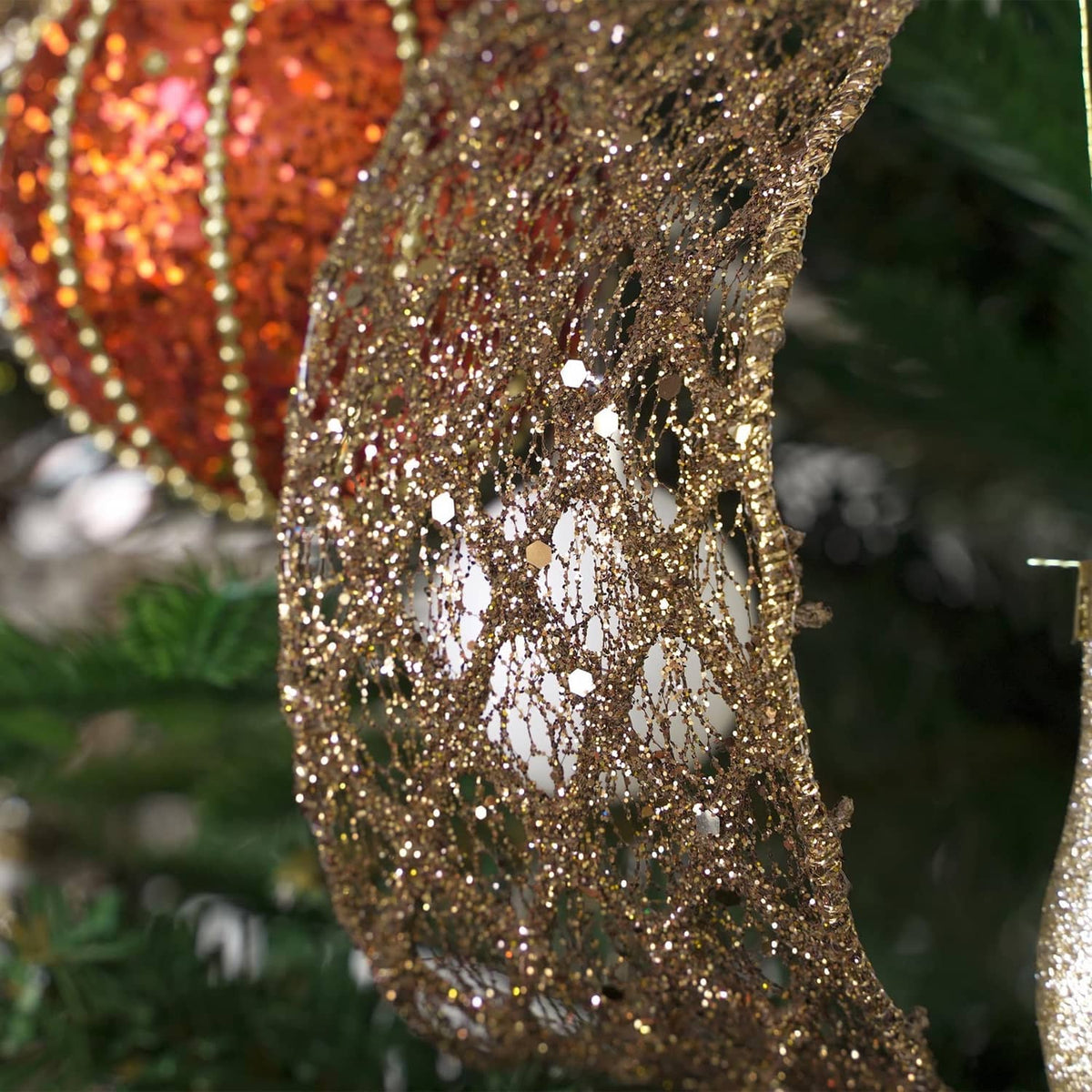 Close-up brown wired glitter ribbon texture with reflective sparkle