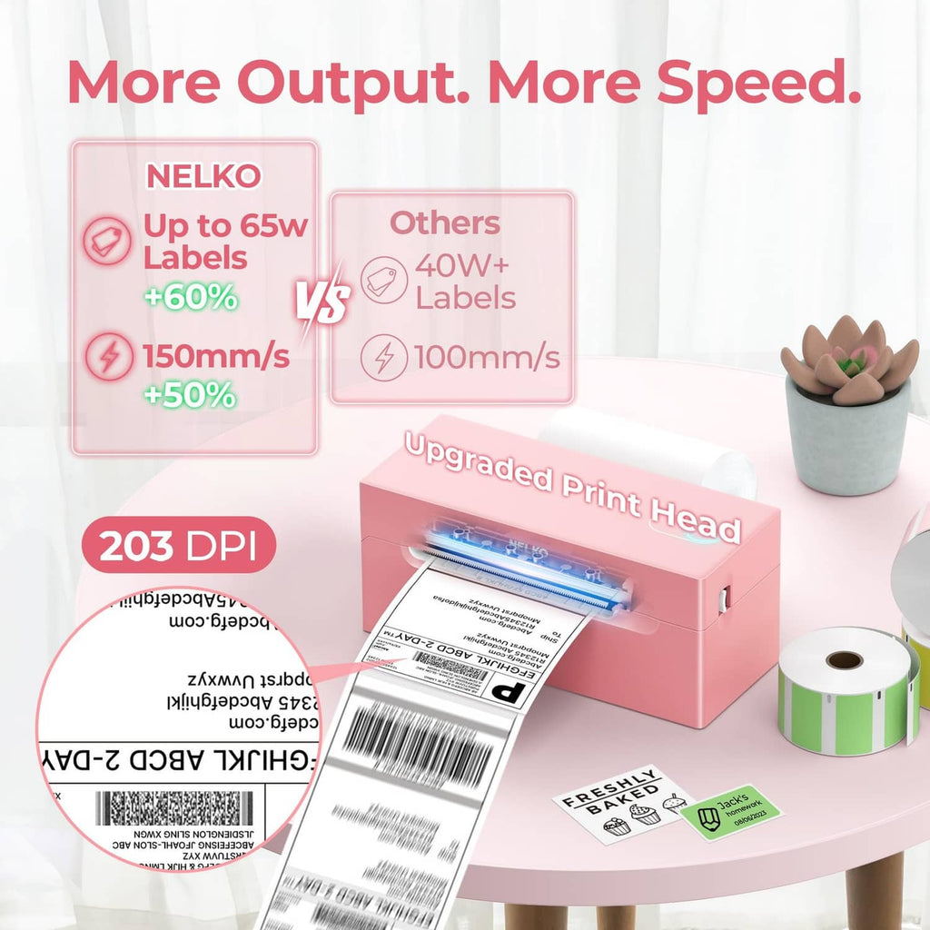 Pink thermal label printer with printed 4x6 label and green label roll