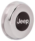 White steering wheel center cap with Jeep logo and black inner ring