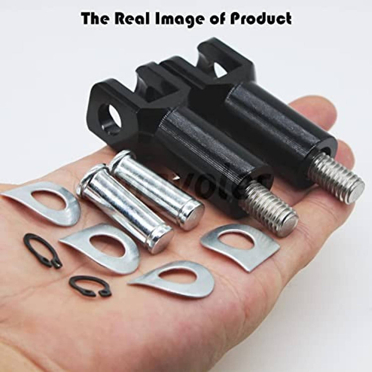 Foot peg clevis mount set in hand with black and chrome bolts, washers, clips
