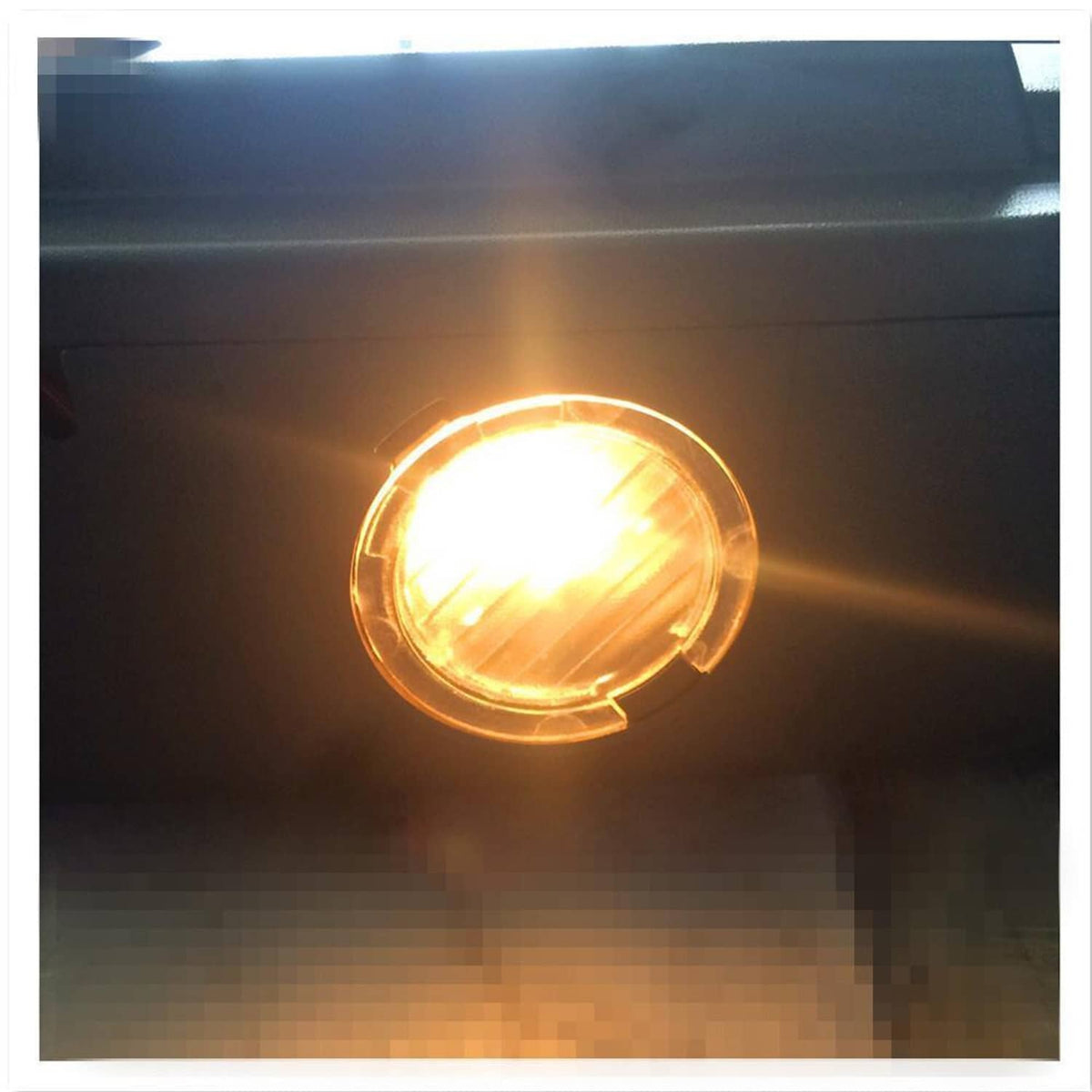 Illuminated amber LED turn-signal lamp on tow mirror