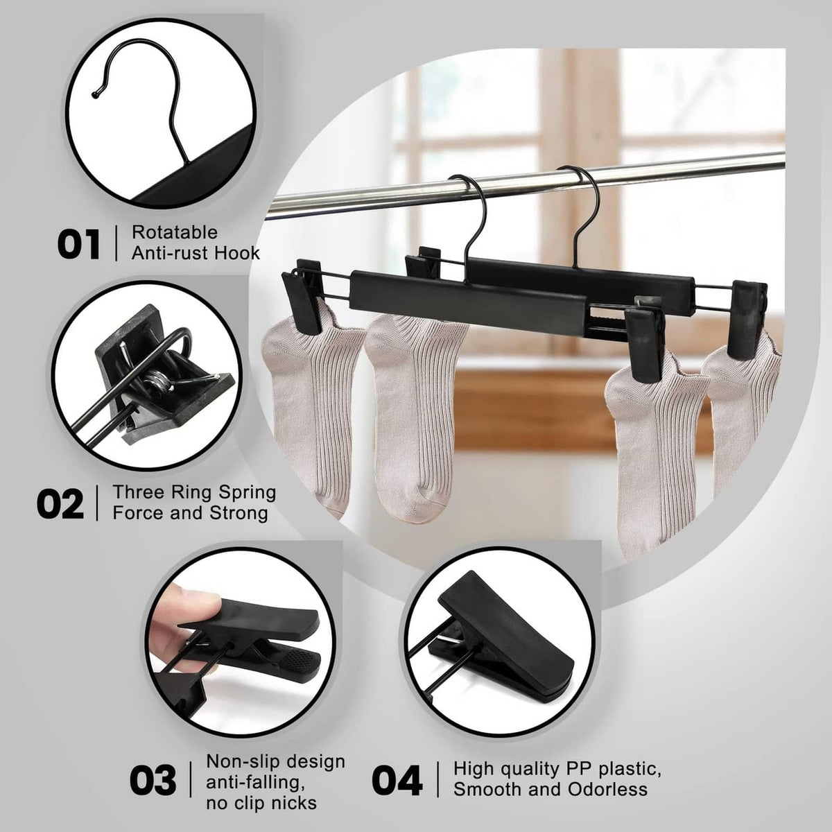 Black pants hanger with rotatable hook and spring clips with non-slip gripping pads