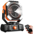 Portable misting fan with black housing and orange accents, with handheld remote