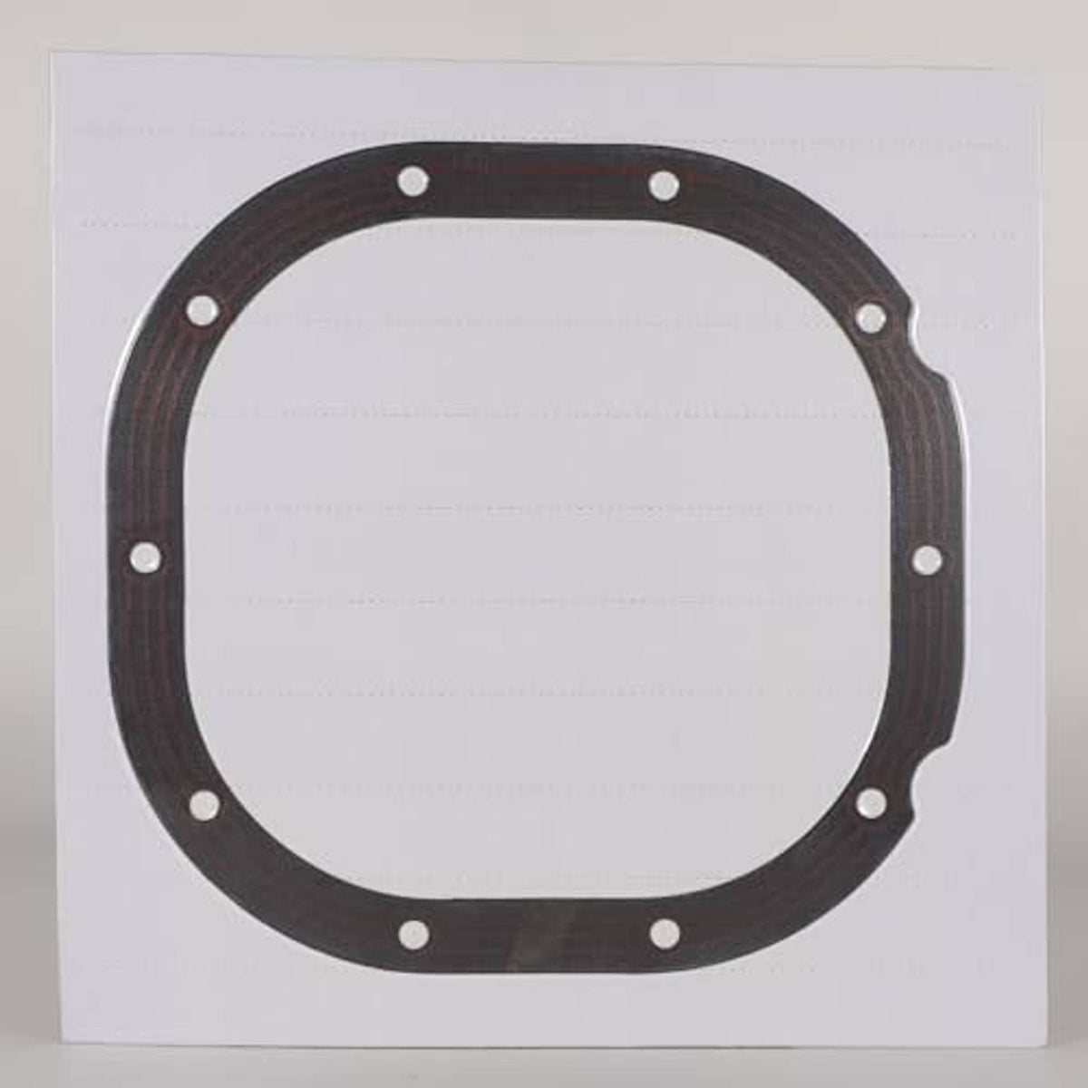 Rear differential cover gasket, dark gray ring with bolt holes on a sheet