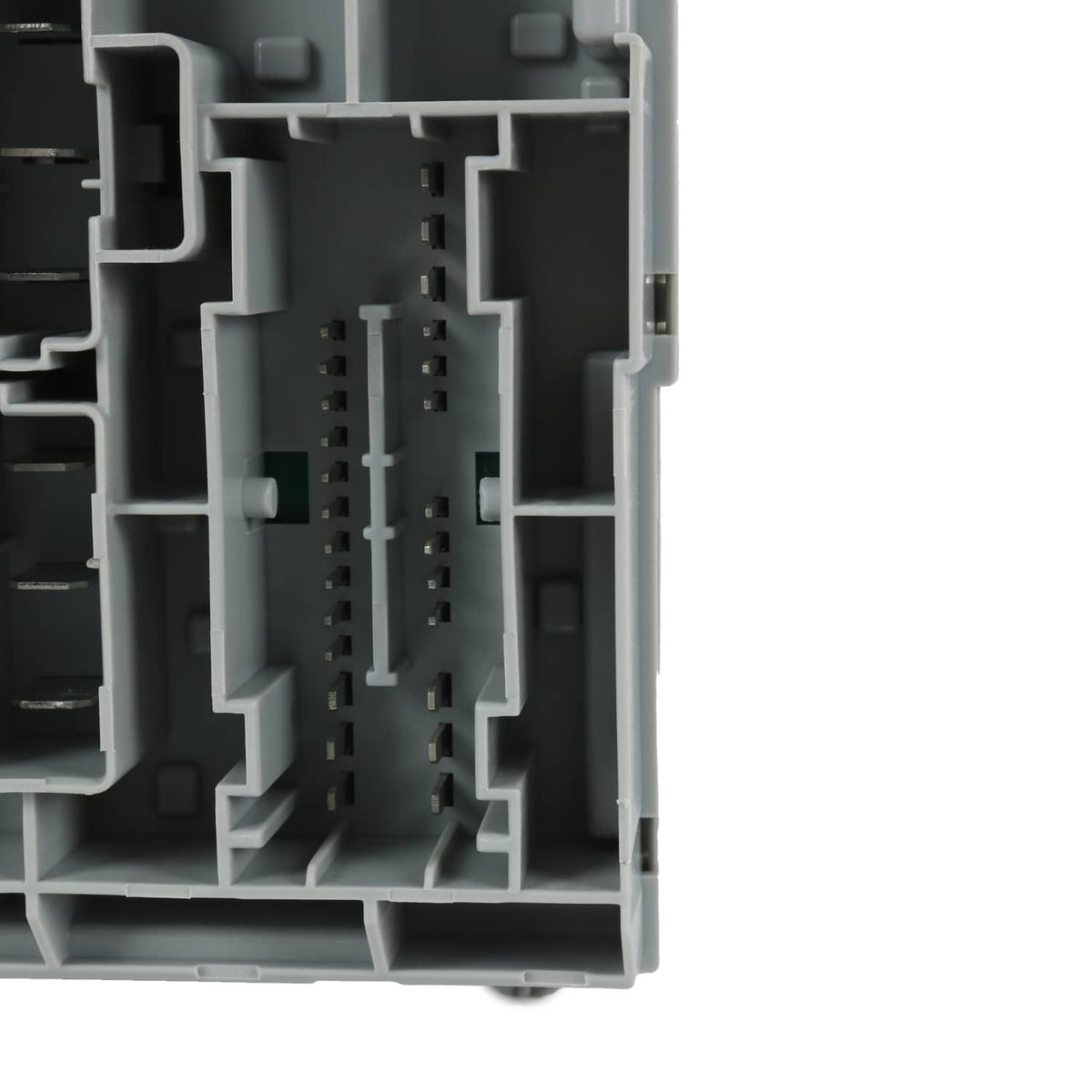 Detail view of gray power distribution center interior with stacked pin connectors