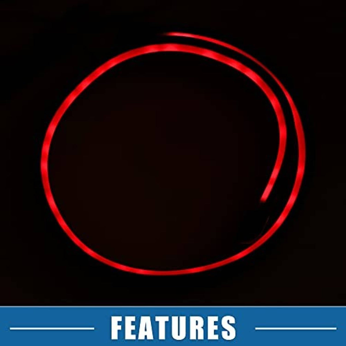 Close-up of red LED brake light ring outline on a black car spoiler strip