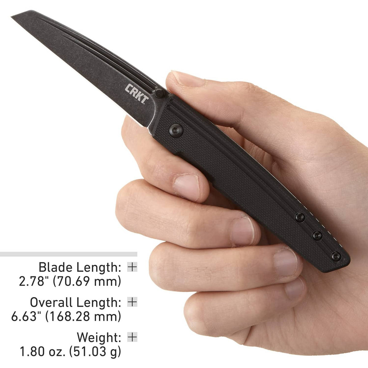 CRKT Inara folding knife held in hand, black textured G10 handle with frame lock