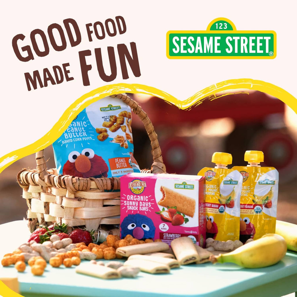 Basket display of organic snack bars and pouches with Sesame Street Good Food Made Fun