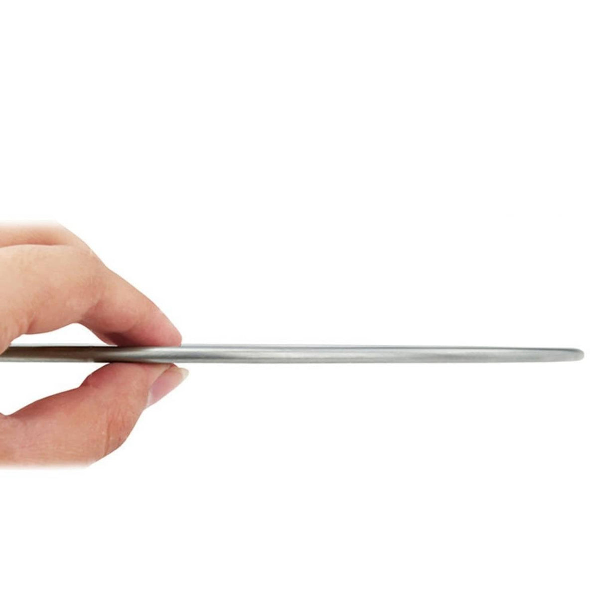 Aluminum pizza pan rim edge, thin metal with smooth silver finish.