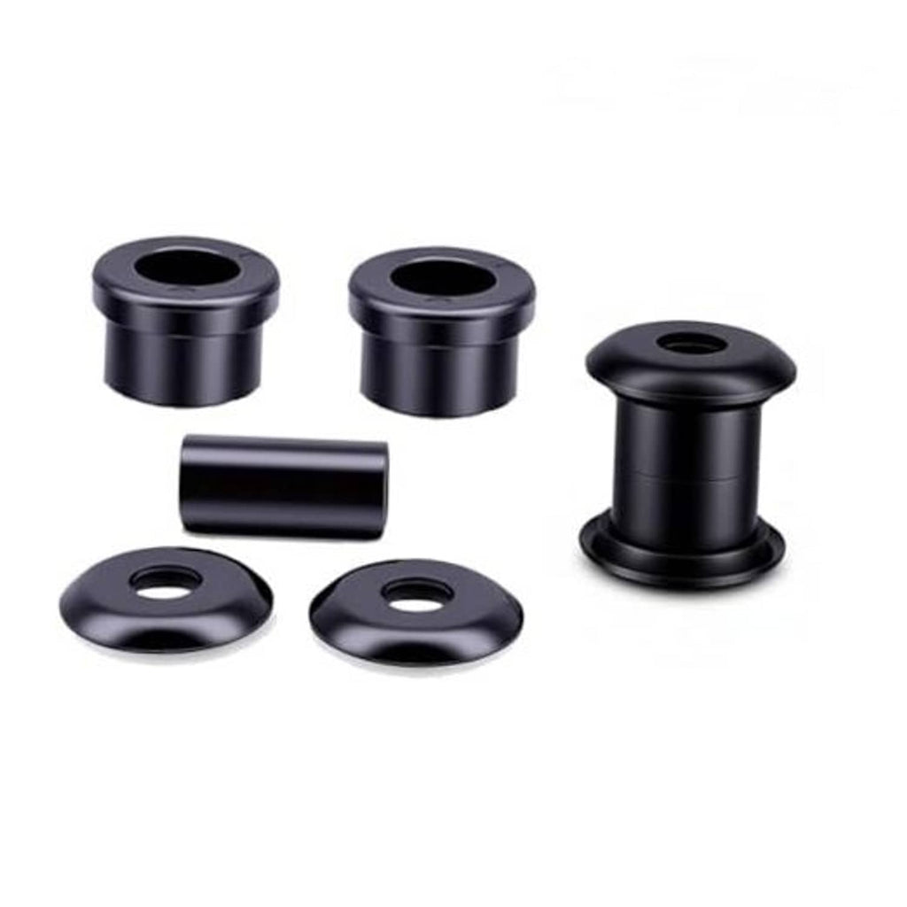 Black polyurethane handlebar riser bushing kit pieces, including tubes and washers