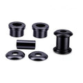 Black polyurethane handlebar riser bushing kit pieces, including tubes and washers