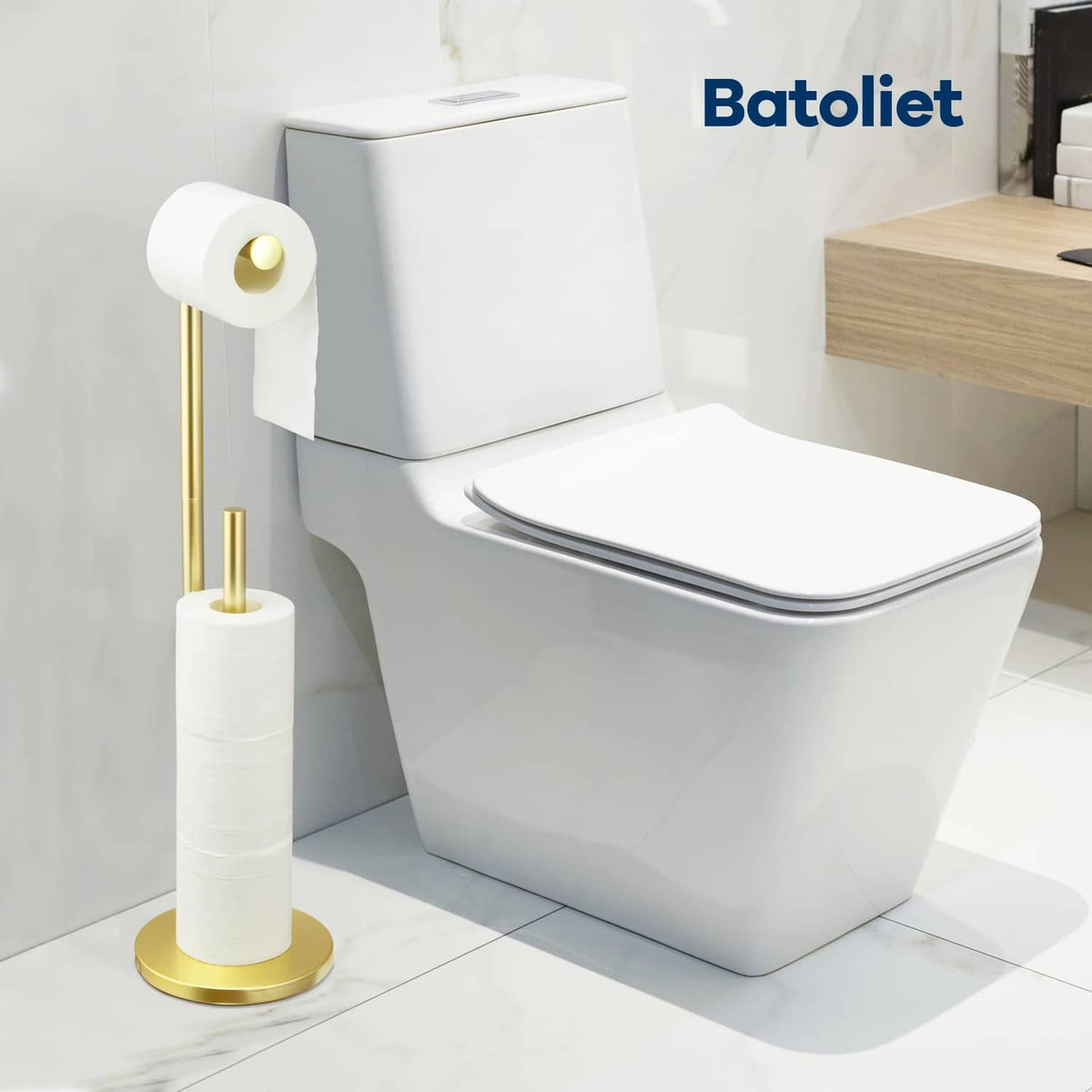 Toilet paper holder stand with gold pole and white roll holder, freestanding