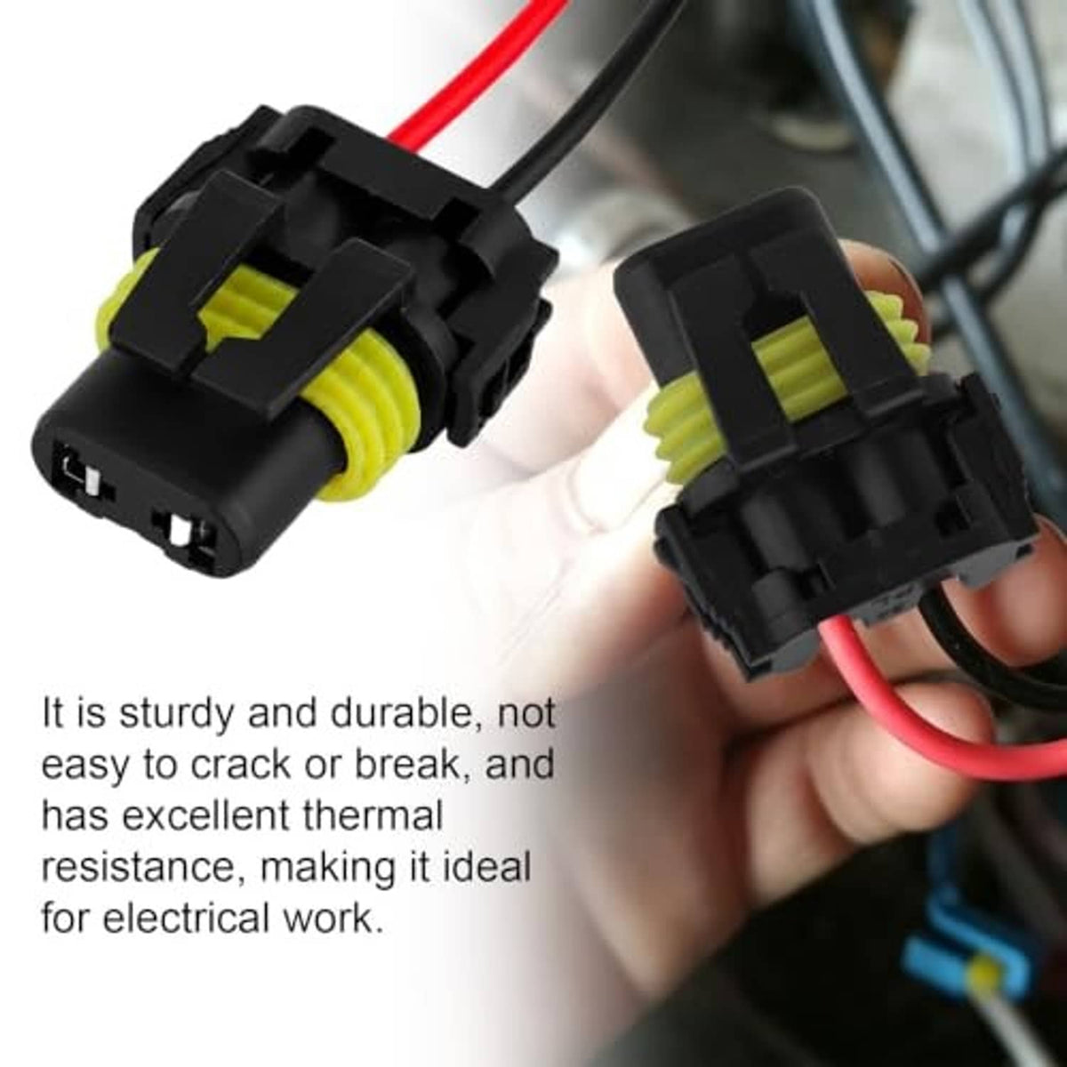 Two headlight connector pigtails with red and black wires, black housings and green wire seals