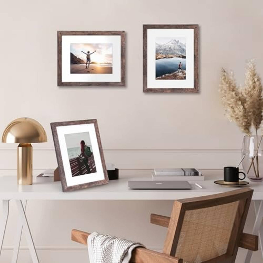 Rustic brown frames arranged with photo prints behind tempered glass fronts