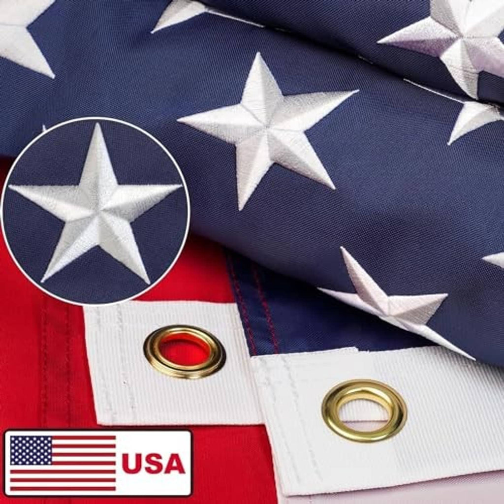 American flag polyester banner with embroidered stars and brass grommets along the top