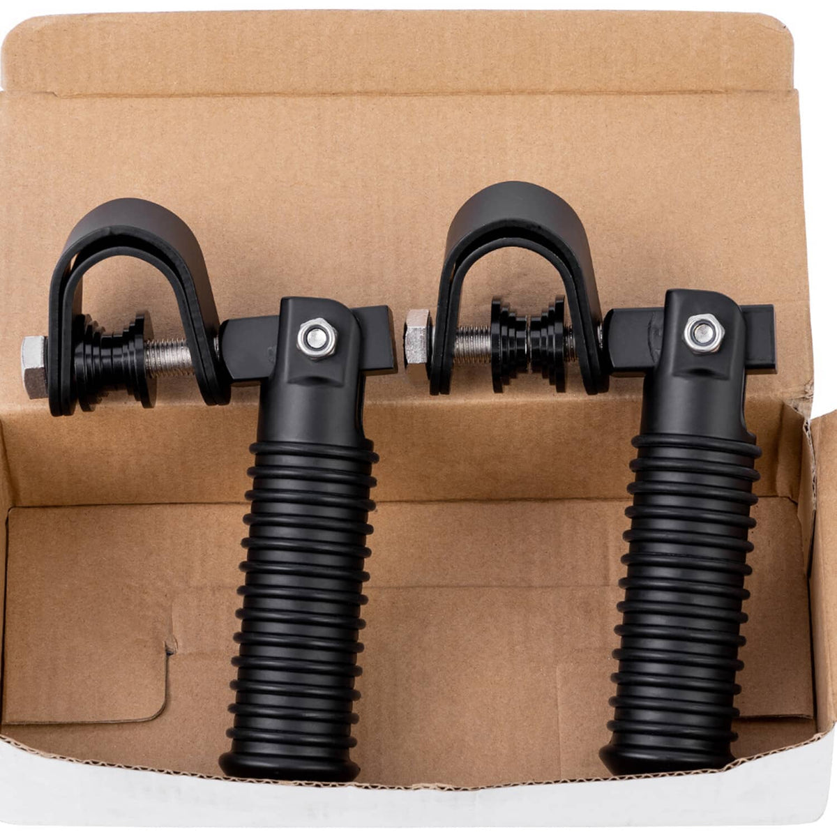 Pair of black motorcycle foot pegs with threaded studs, rubber coils, and U brackets