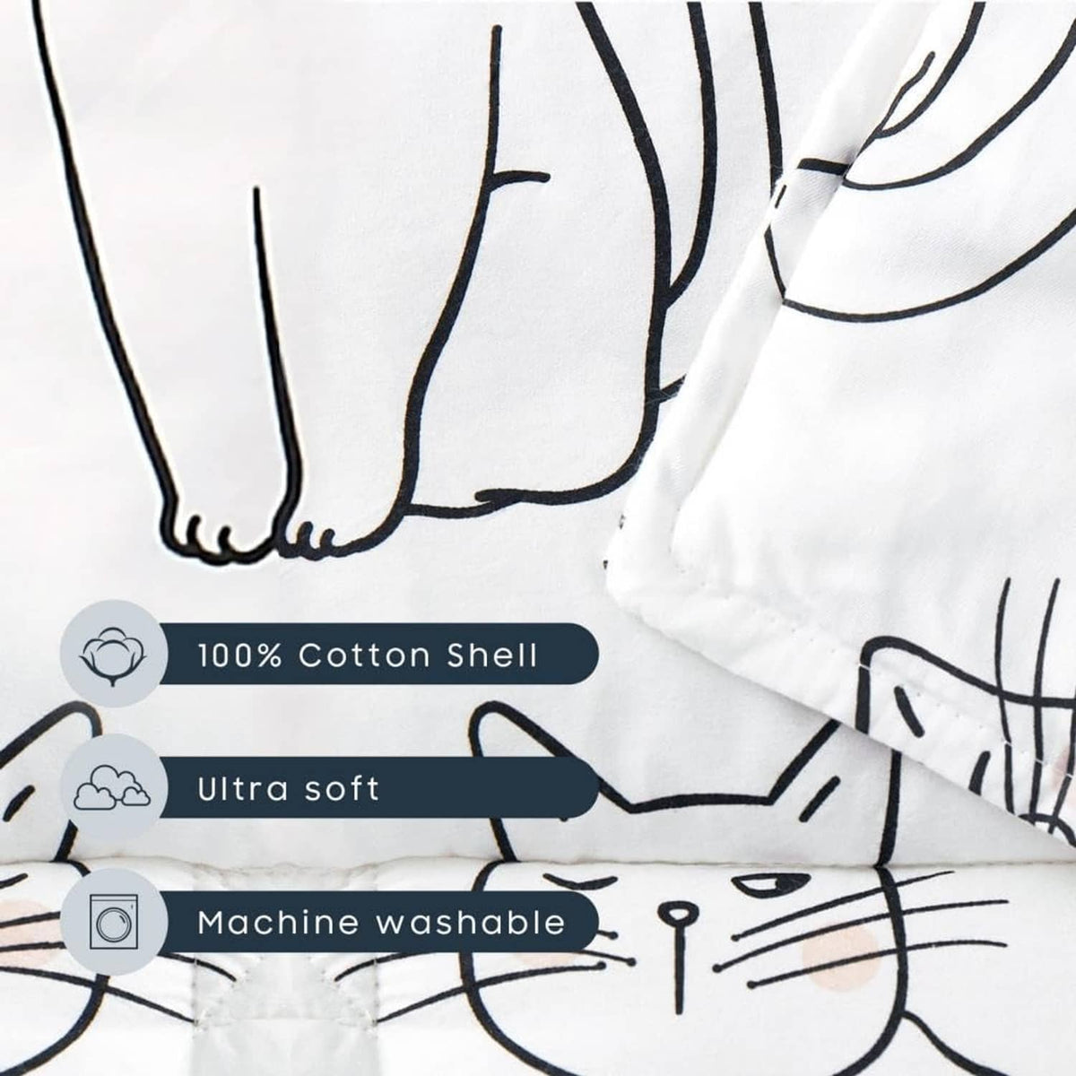 Toddler nap mat fabric close-up: soft black-and-white cat print, cotton shell look