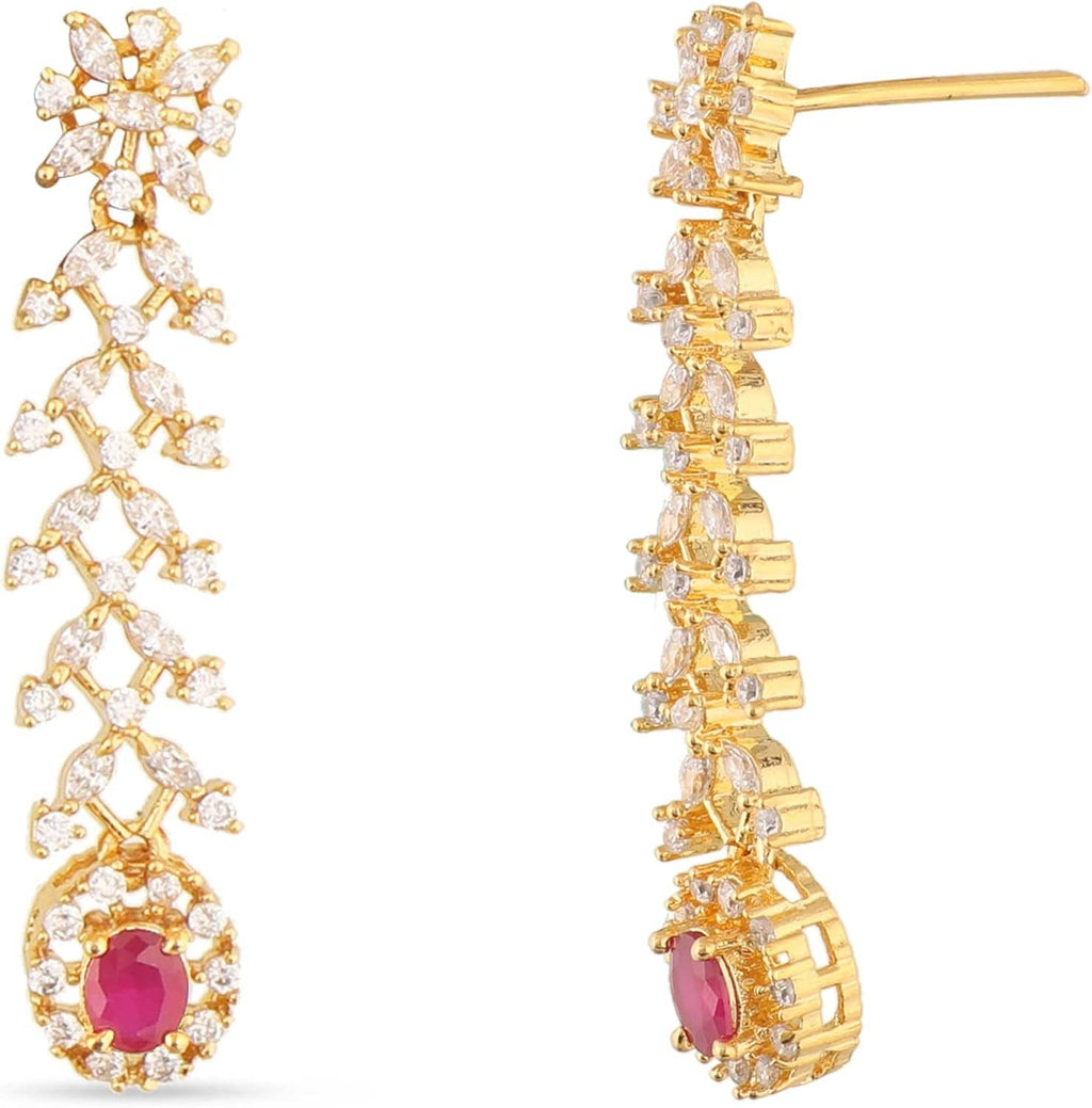 Gold-tone CZ drop earrings with white flower details and purple oval stone
